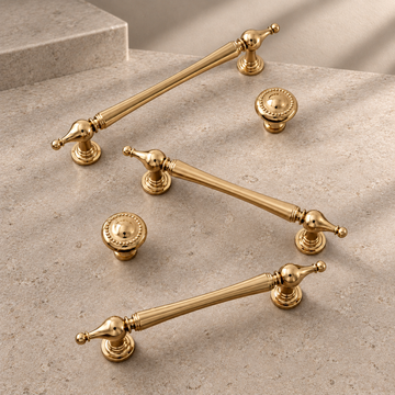 Solid Brass Cabinet Pull & Knob — PVD Bright Gold Finish on a neutral stone studio background
