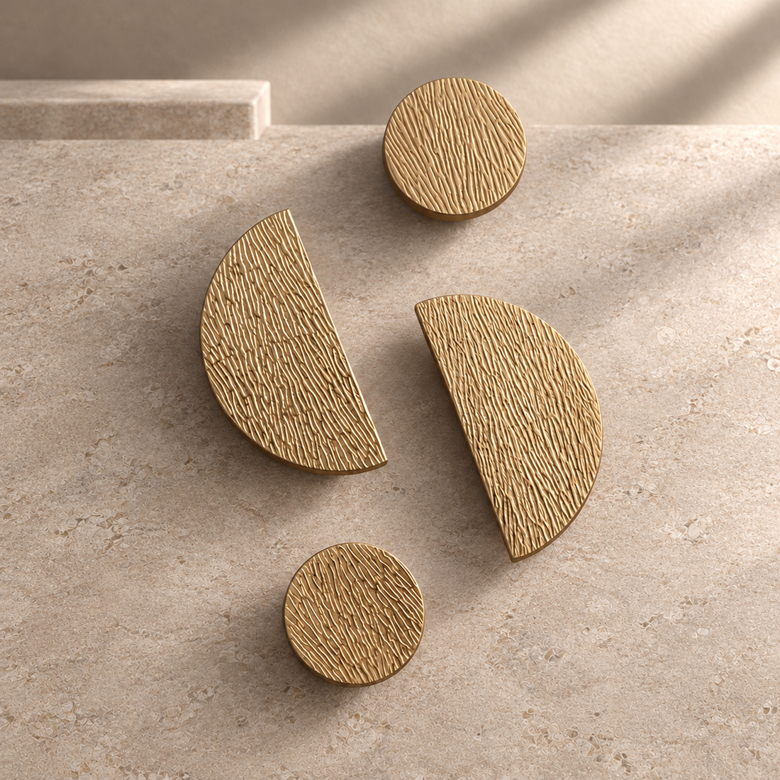 Textured Half-Moon Cabinet Pull & Knob — PVD Gold on a neutral stone studio background