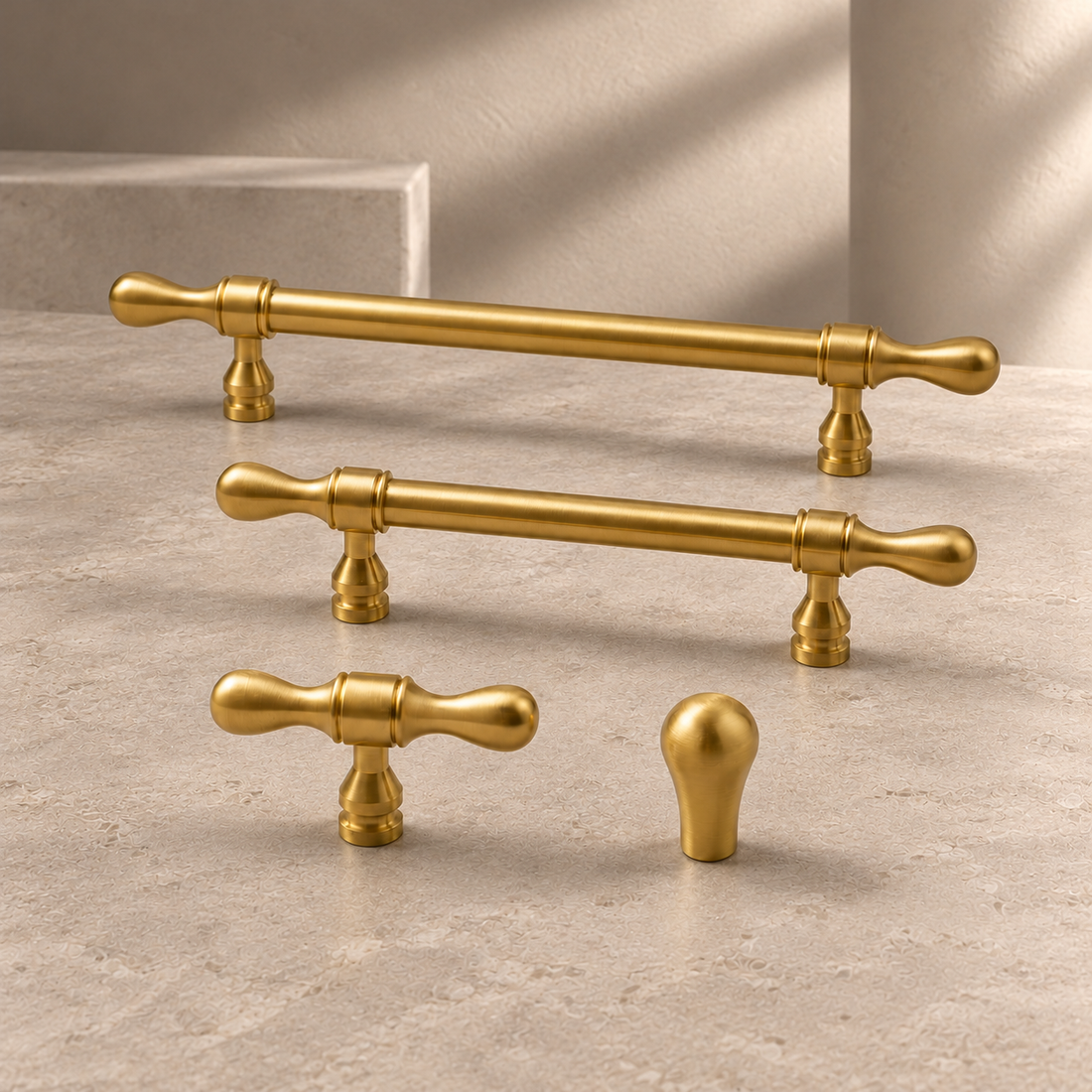 Solid Brass Drop-Shaped Cabinet Pull & Knob — Polished Brass Finish on a neutral stone studio background