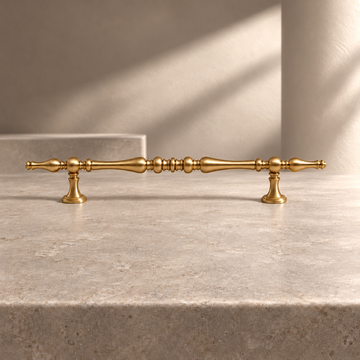 Solid Brass Teardrop Cabinet Pull & Knob - Brushed Brass Finish on a neutral stone studio background