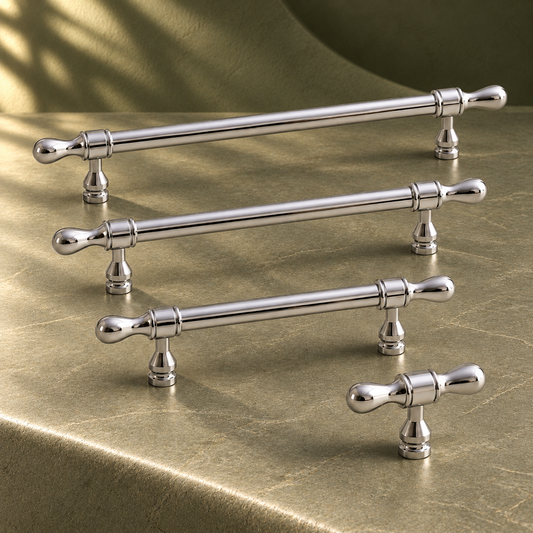 Solid Brass Teardrop Cabinet Pull & T-Knob — Bright Chrome Finish on a deep olive studio background