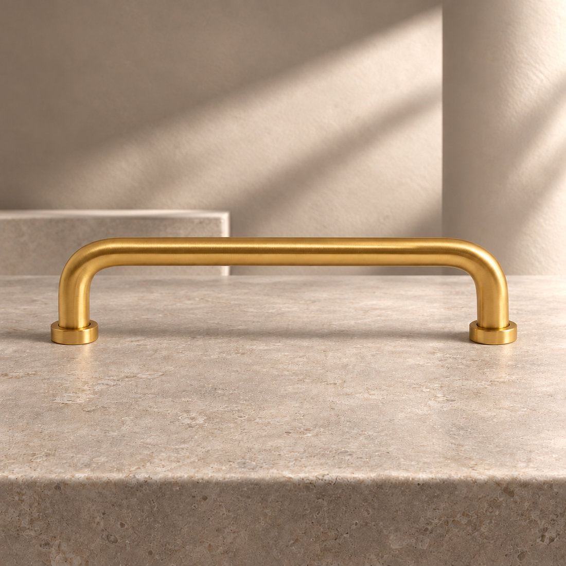 Solid Brass U-Shaped Cabinet Pull & Knob - Brushed Brass Finish on a neutral stone studio background