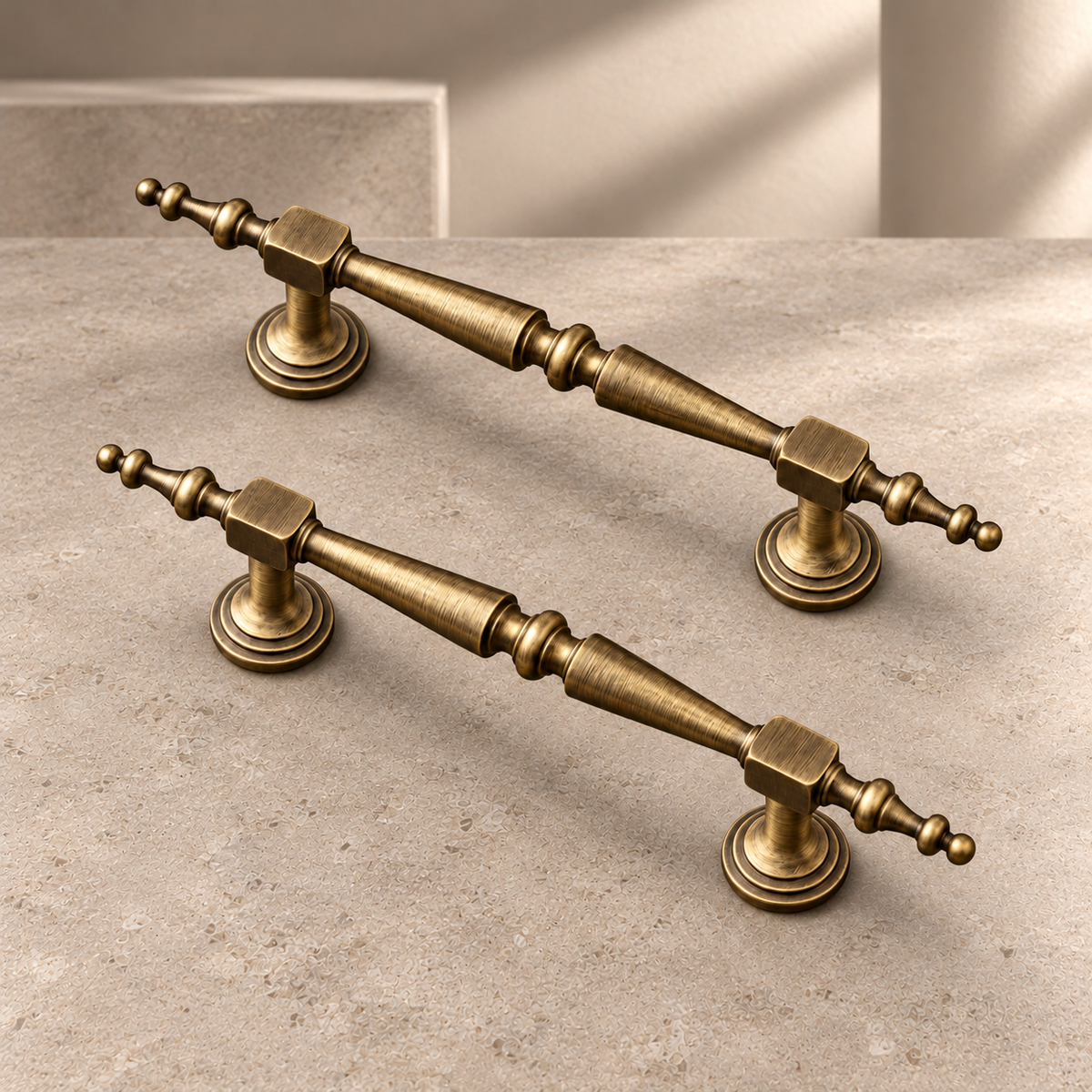 Solid Brushed Antique Brass Cabinet Pull & Knob — Luxury Modern Design on a neutral stone studio background
