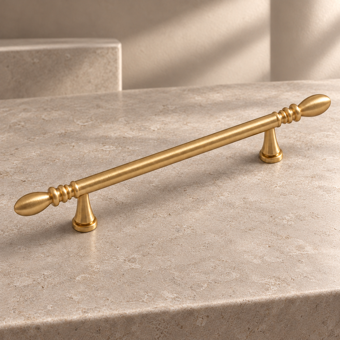 Solid Brushed Brass Cabinet Pull & Knob — Teardrop Design on a neutral stone studio background