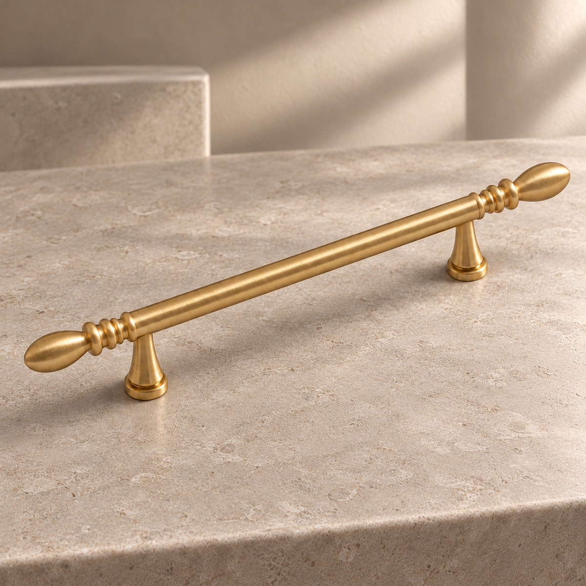 Solid Brushed Brass Cabinet Pull & Knob — Teardrop Design on a neutral stone studio background