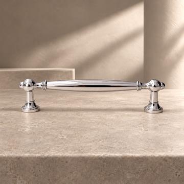 Solid Chrome Brass Cabinet Pull & Knob — Modern Luxury Design on a neutral stone studio background