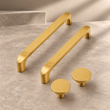 Solid Gold Brass Cabinet Pull & Knob — Modern Kitchen Design on a neutral stone studio background