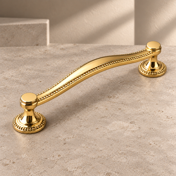 Solid PVD Brass Cabinet Pull & Knob — Luxury Vintage Design on a neutral stone studio background