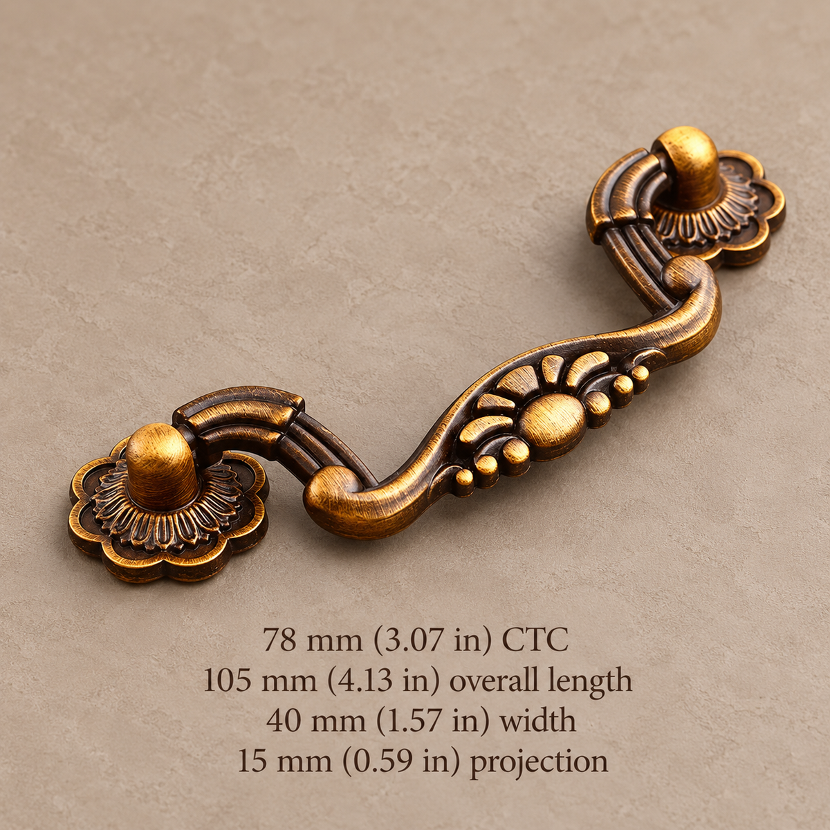 Antique brass floral 78 mm CTC cabinet pull with measurements in millimeters and inches