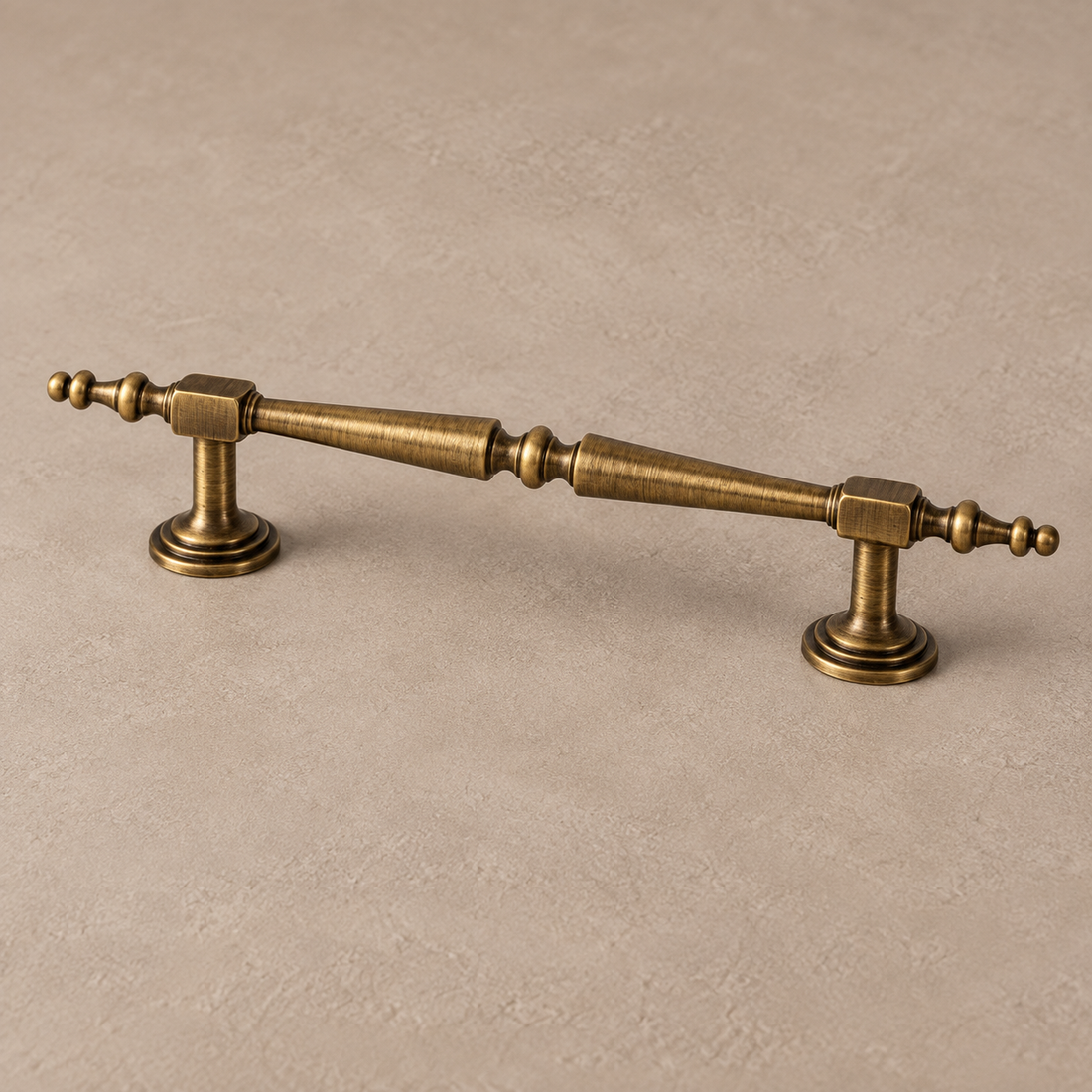 Solid Brushed Antique Brass Cabinet Pull & Knob — Luxury Modern Design on a neutral stone studio background