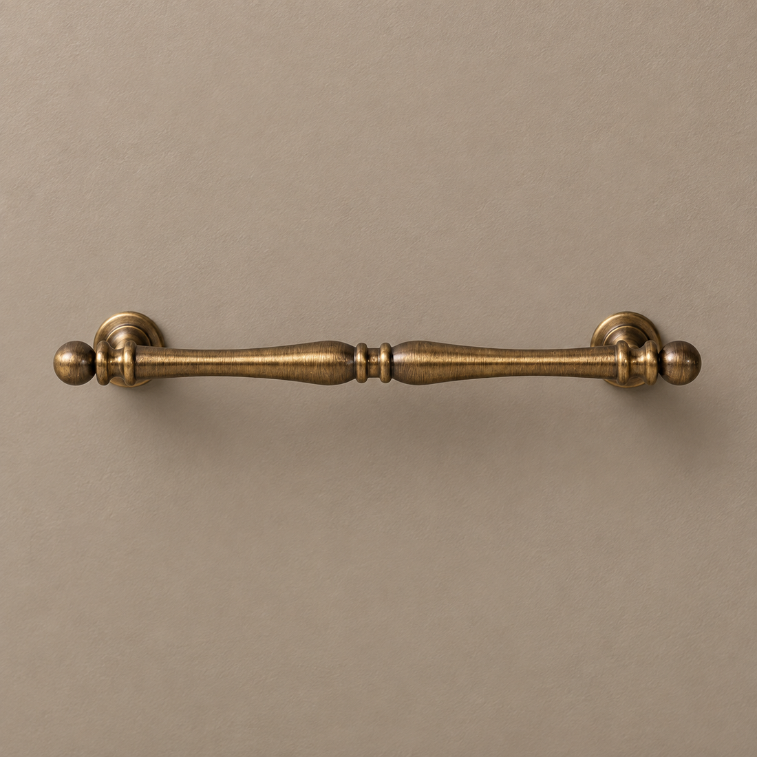 Solid Brass Cabinet Handle & Knob — Brushed Antique Brass Finish on a neutral stone studio background