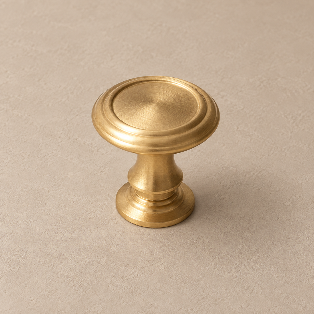 Brushed Brass T-Bar Cabinet Pulls & Knob — Solid Brass Kitchen & Furniture Hardware on a neutral stone studio background