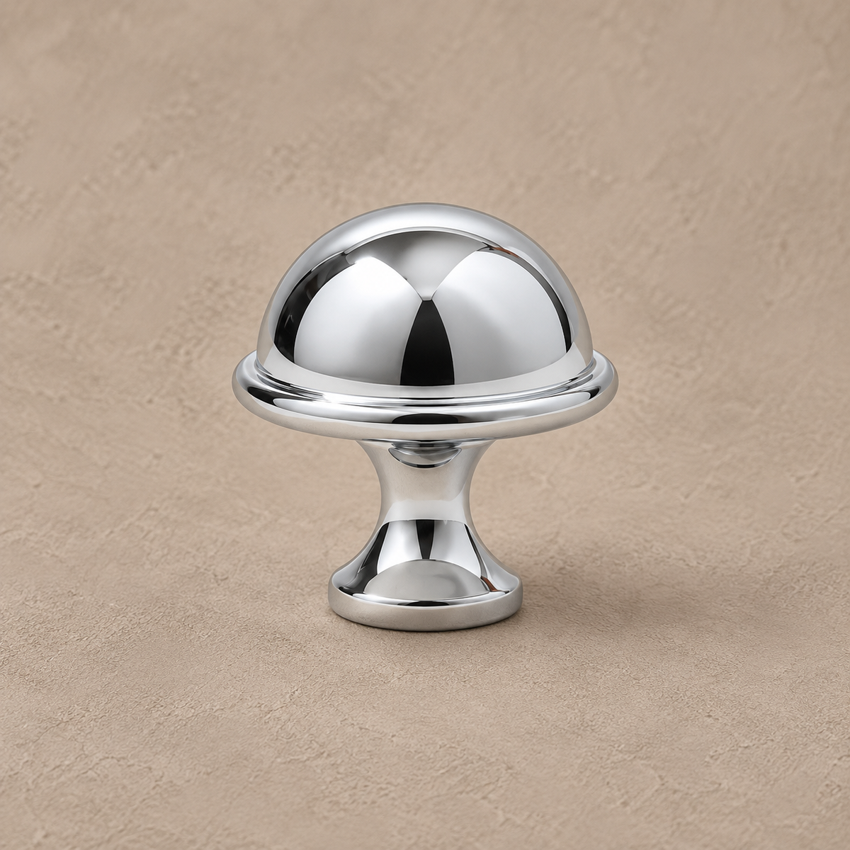 Polished chrome hat-style cabinet knob detail