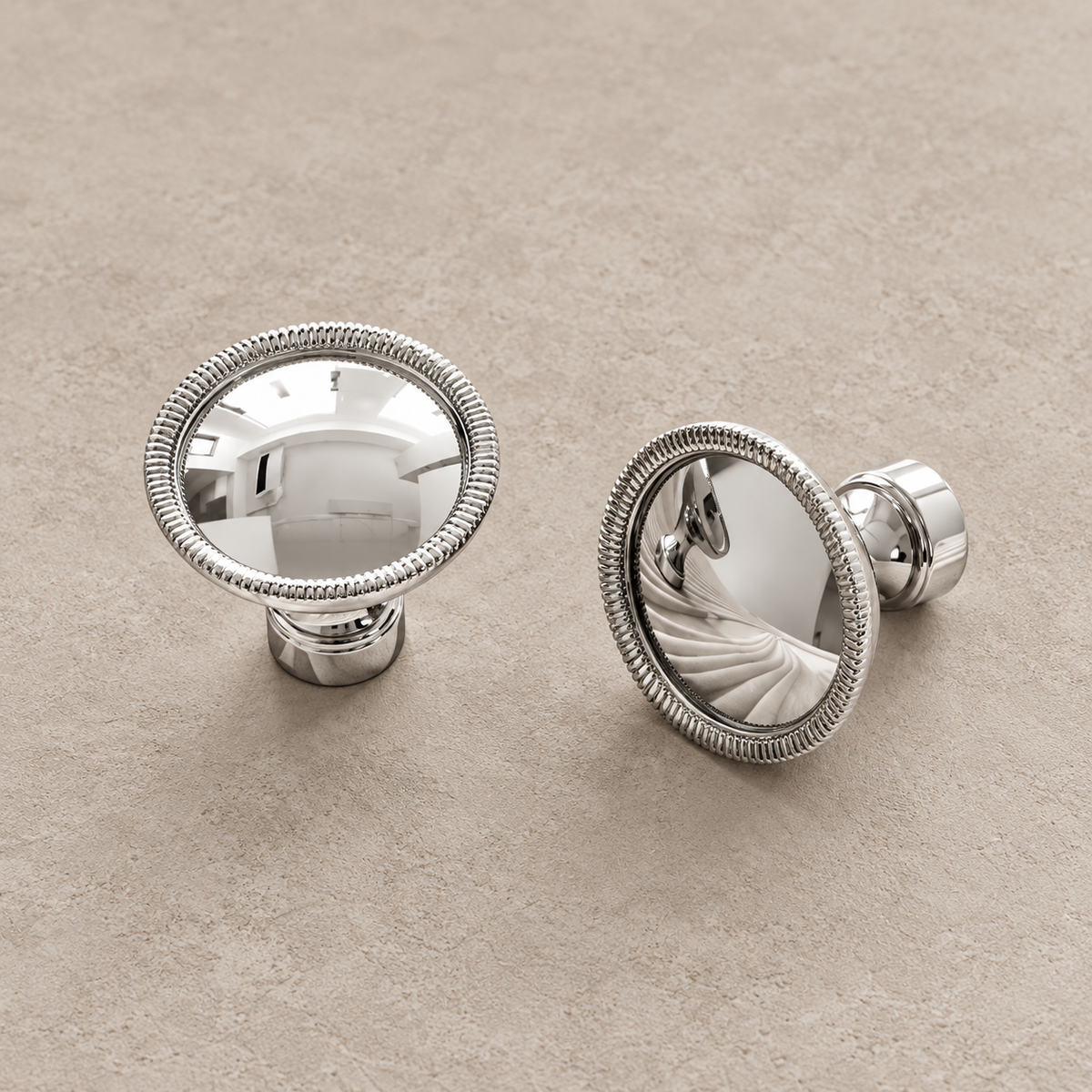 Chrome domed cabinet knobs with reeded rims on taupe plaster