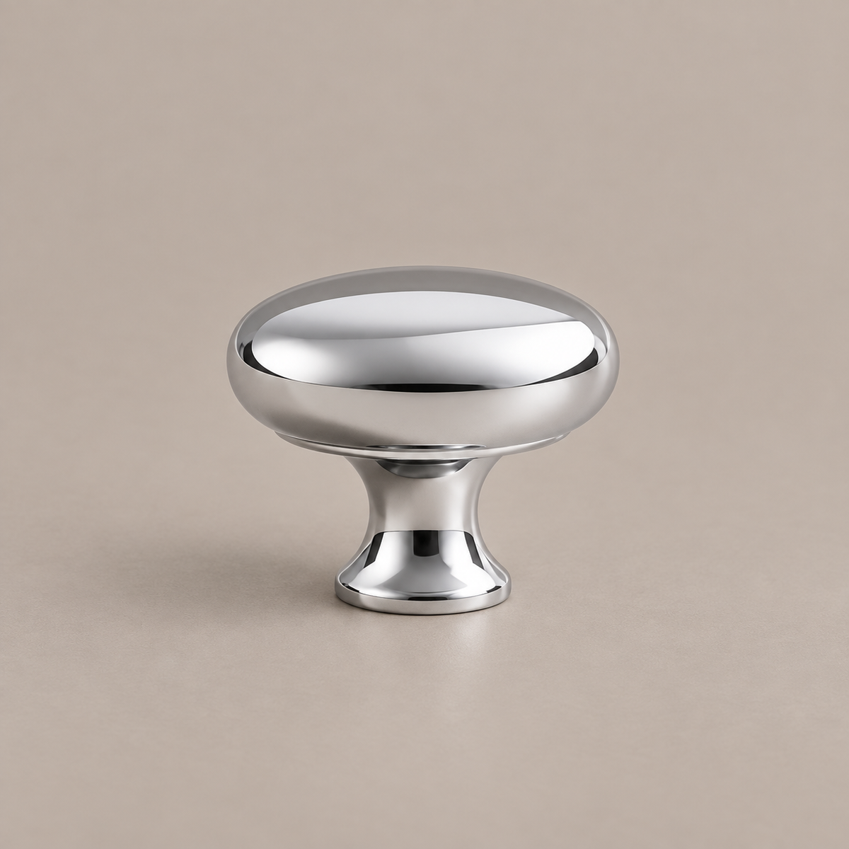 Chrome U-shaped cabinet hardware — support on taupe studio background
