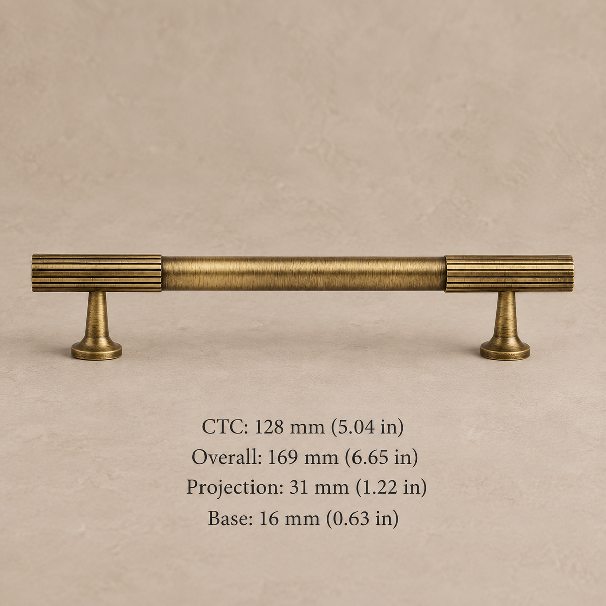 antique brass fluted cabinet pull on warm taupe studio background