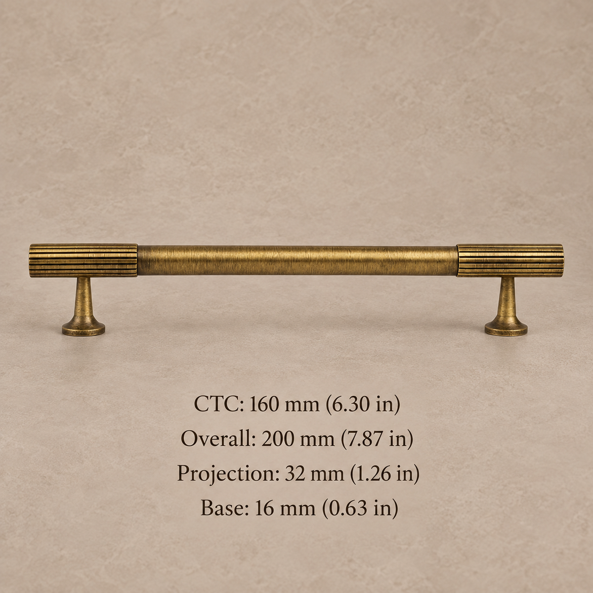 antique brass fluted cabinet pull on warm taupe studio background