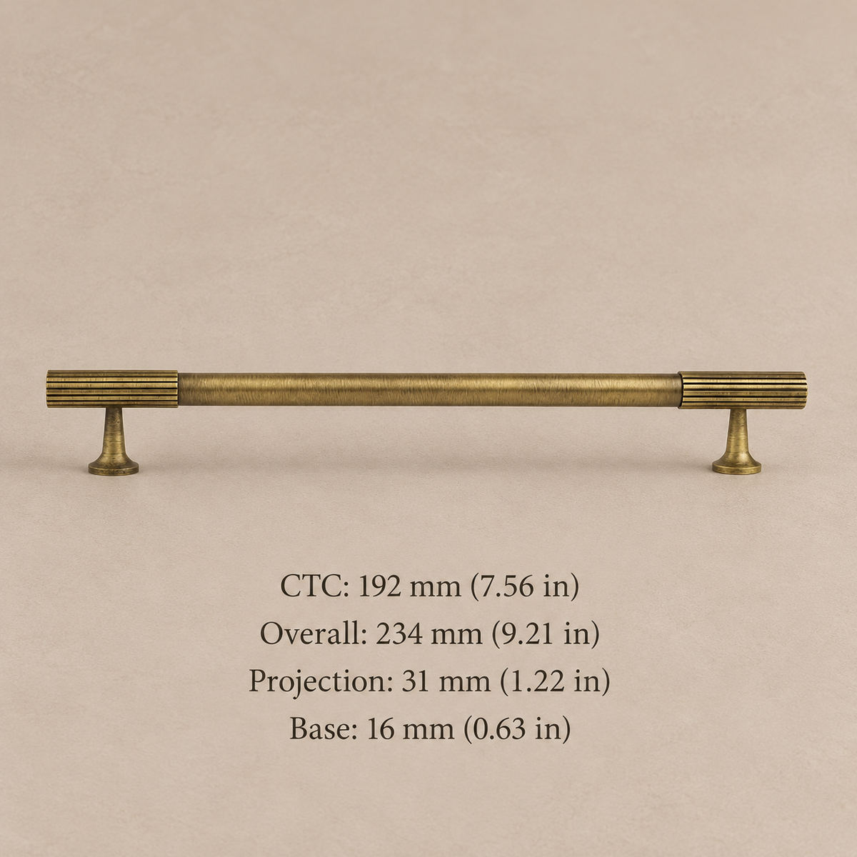 antique brass fluted cabinet pull on warm taupe studio background