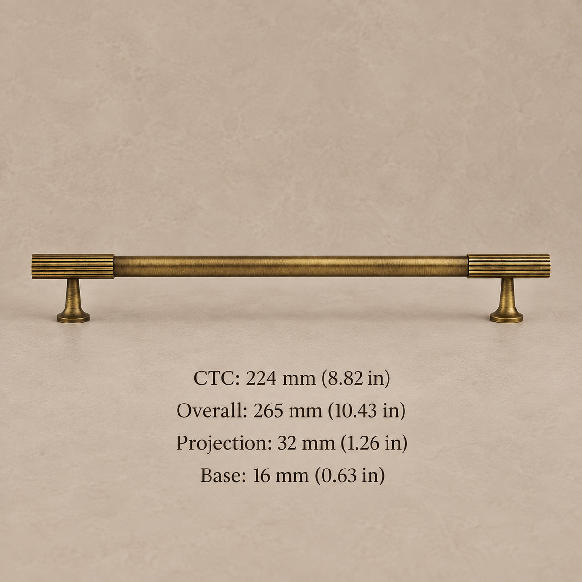 antique brass fluted cabinet pull on warm taupe studio background