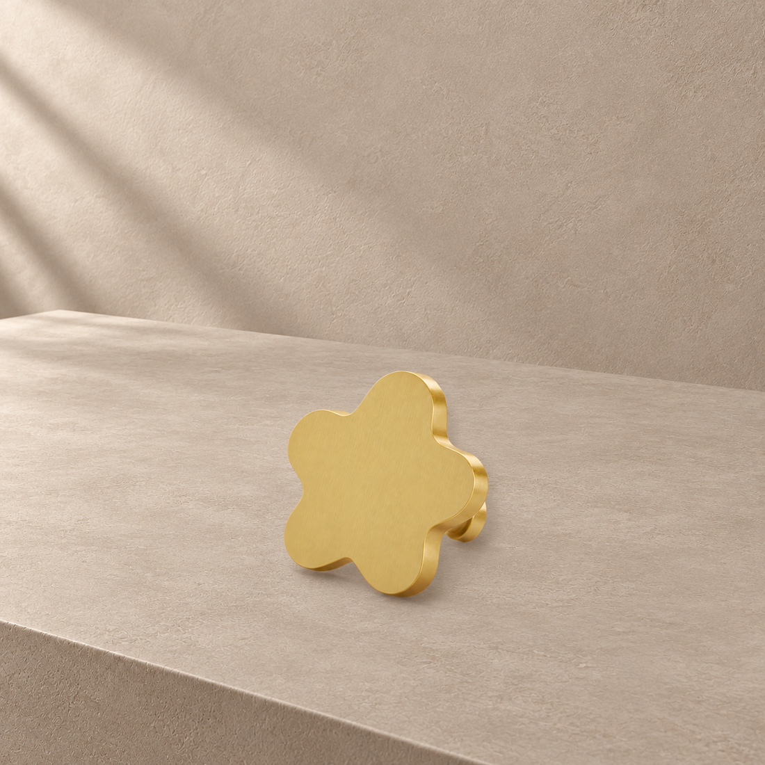 Gold Star Cabinet Knob — Solid Brass Decorative Hardware on a deep olive studio background