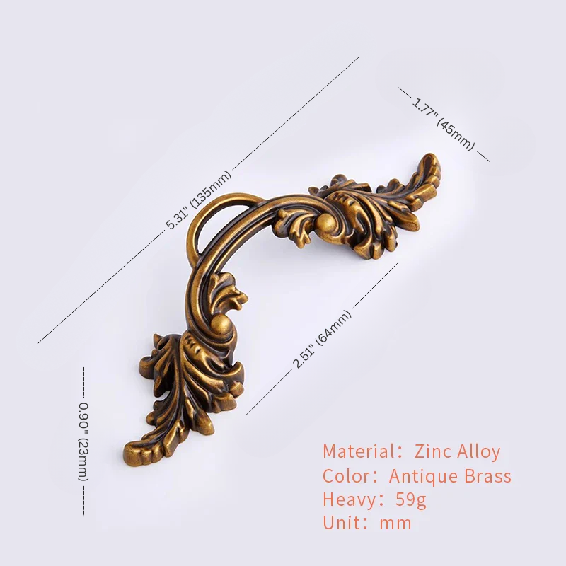 Decorative brass handle with measurements on a white background