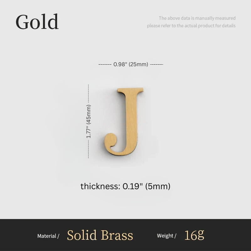 Gold letter 'J' with measurements on a gray background