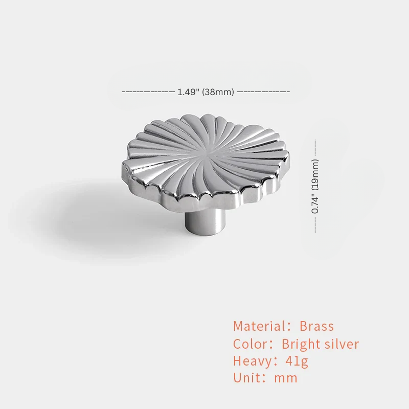 Brass knob with measurements on a white background