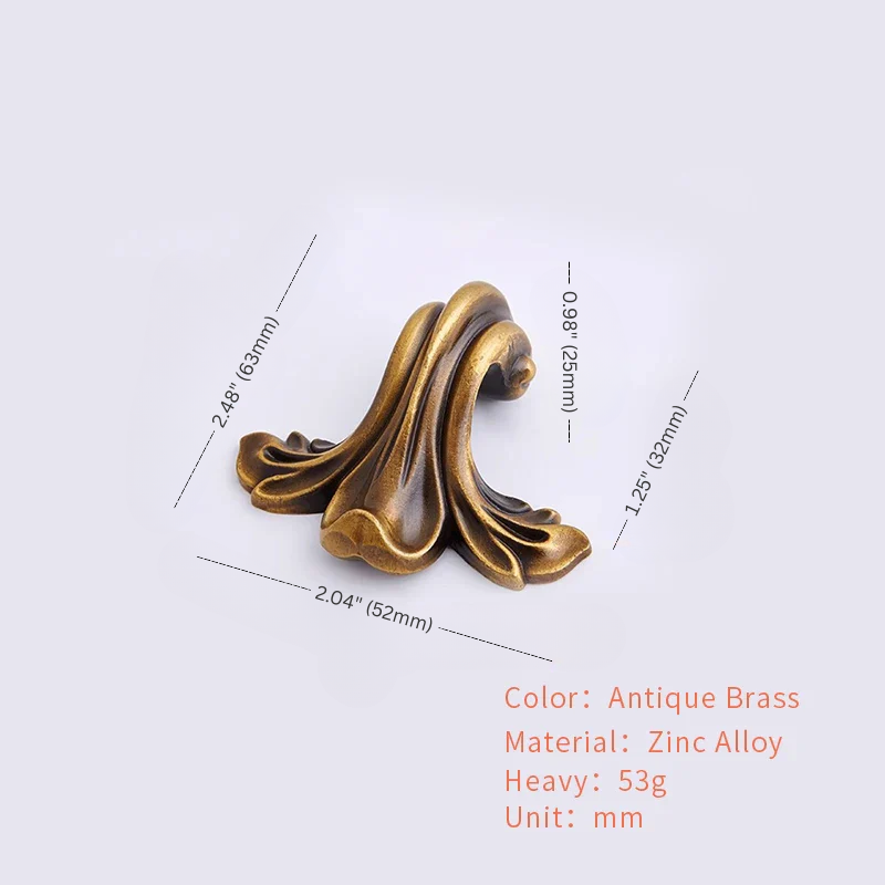 Antique brass decorative element with measurements on a white background