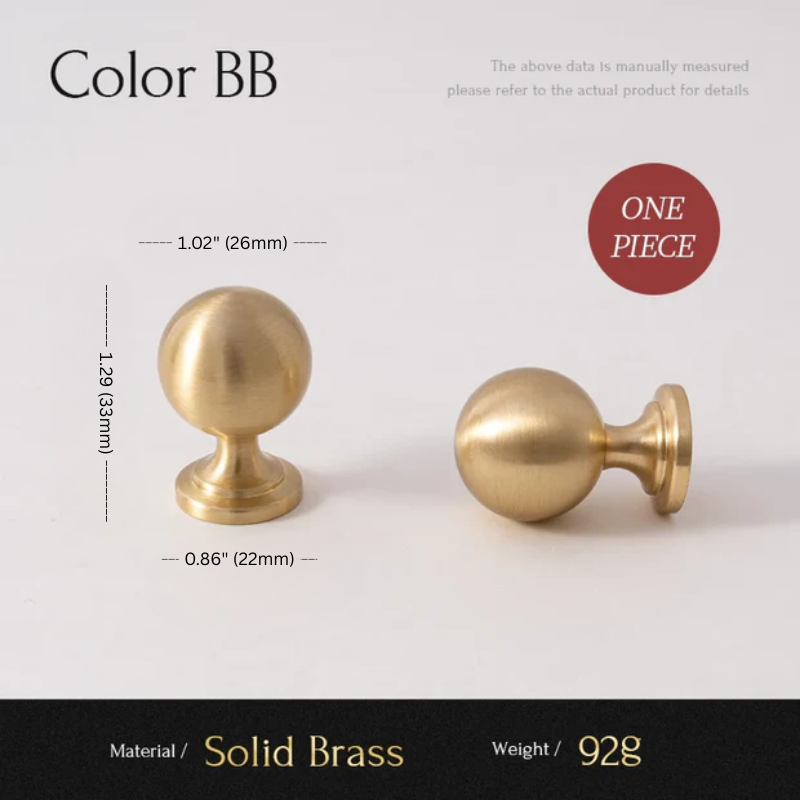 Two solid brass knobs with measurements and material details on a white background