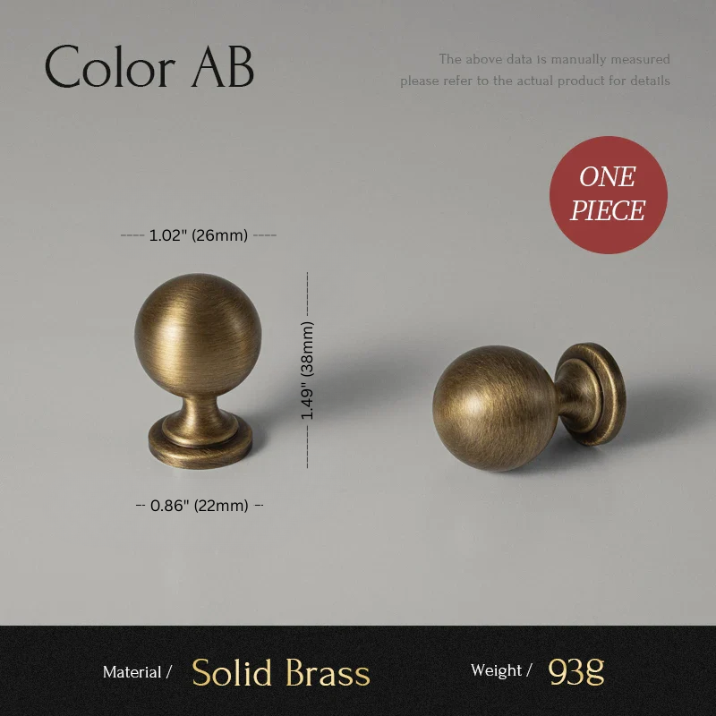 Two solid brass cabinet knobs with measurements on a gray background