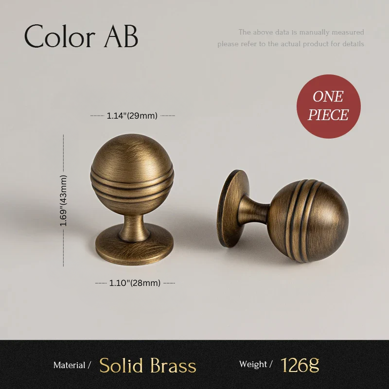 Two solid brass cabinet knobs with measurements and material details on a neutral background
