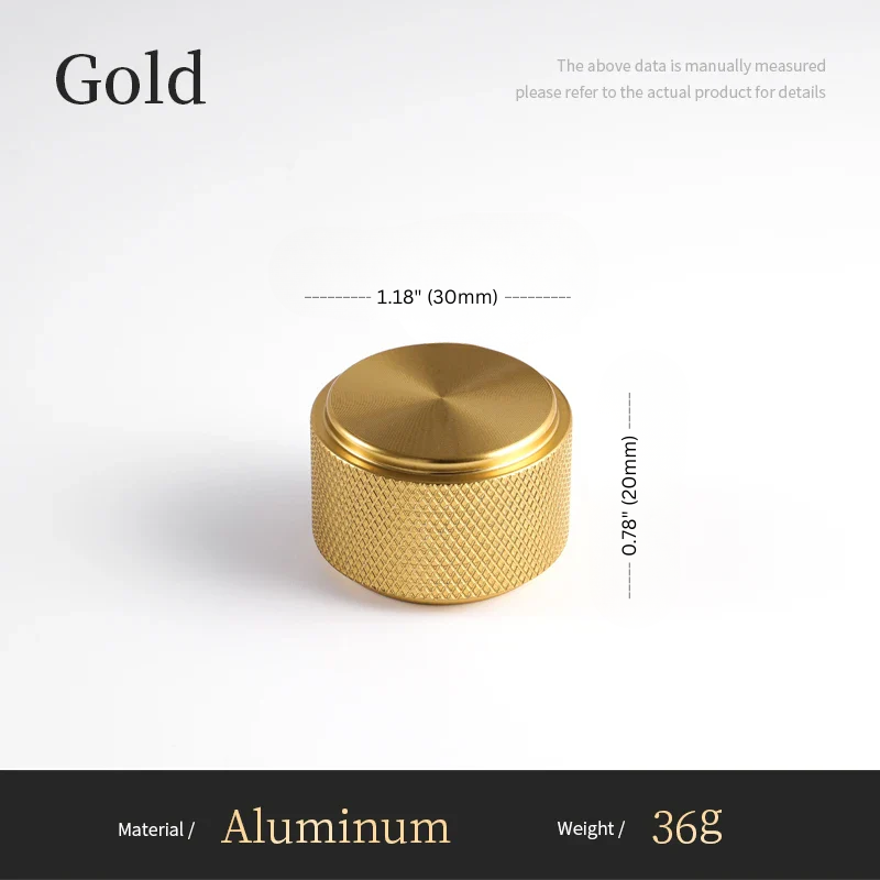 Gold-colored aluminum knob with measurements on a white background