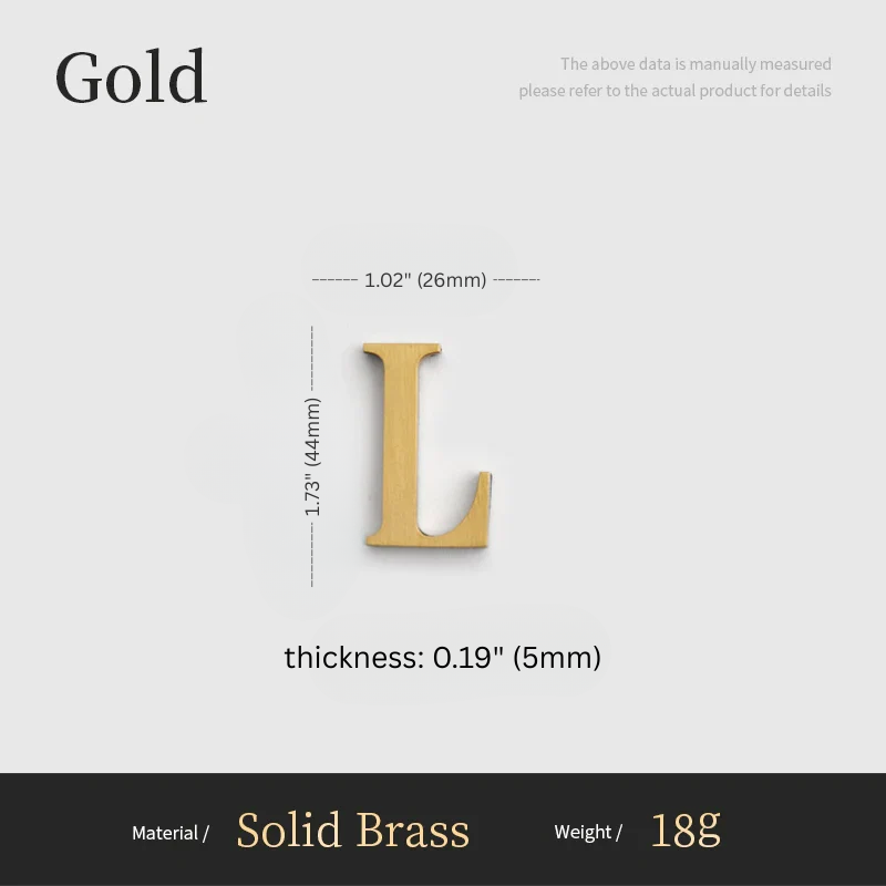 Gold letter 'L' with measurements on a gray background