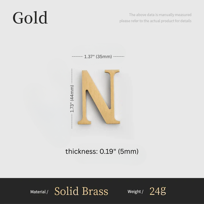 Gold letter 'N' with measurements on a gray background