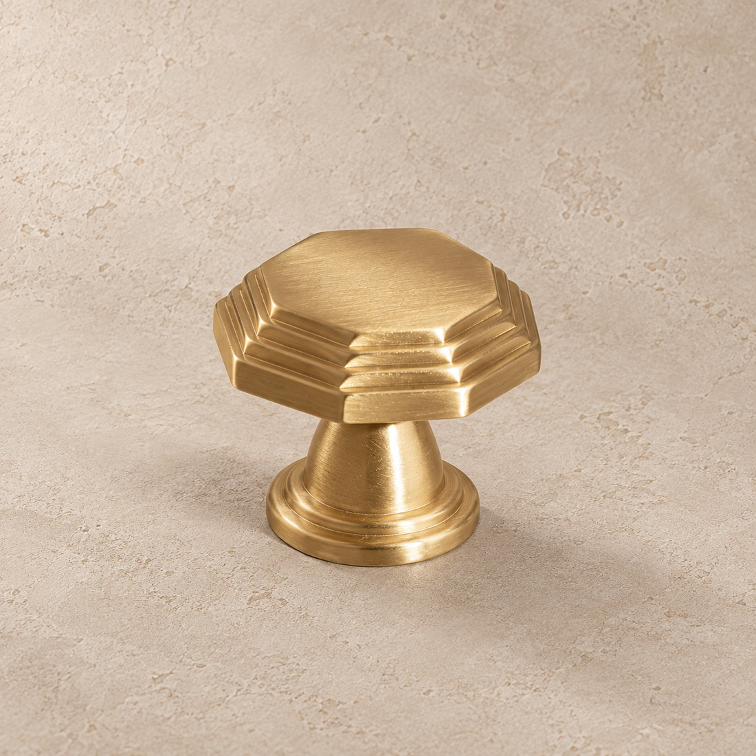 Polished Brass European-Style Cabinet Pulls & Knob — Solid Brass Hardware on a neutral stone studio background