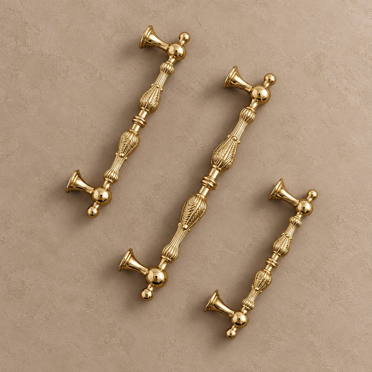 Three sizes of polished brass European cabinet pulls
