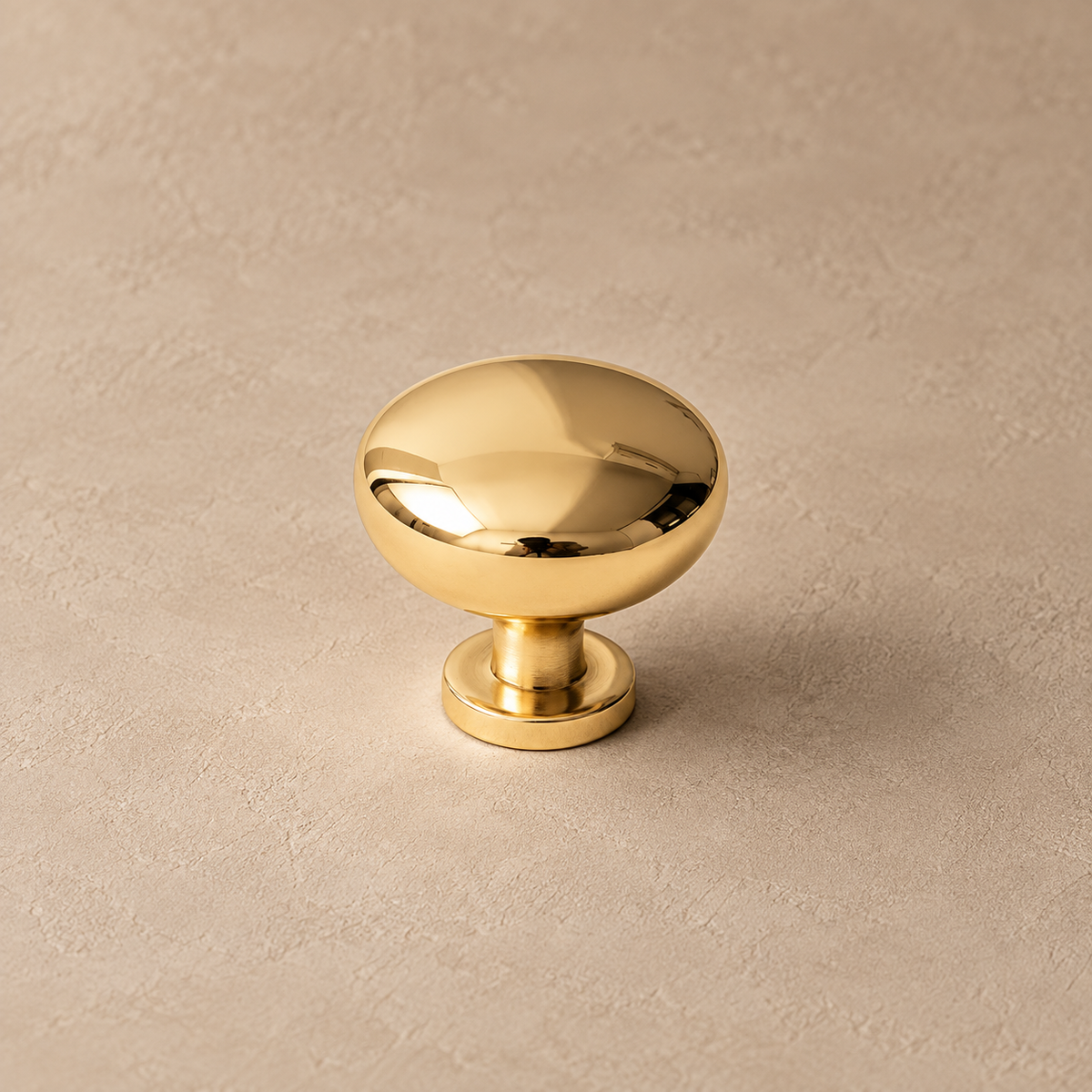 Polished brass domed cabinet knob detail