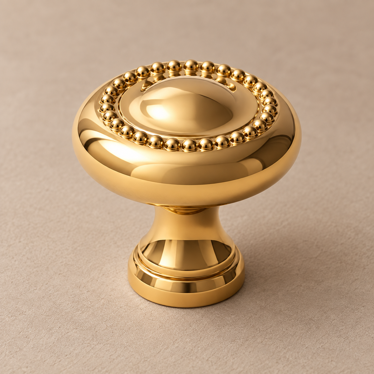 Polished gold beaded knob closeup