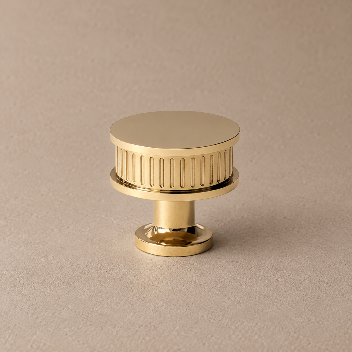 Polished gold fluted drum cabinet knob detail