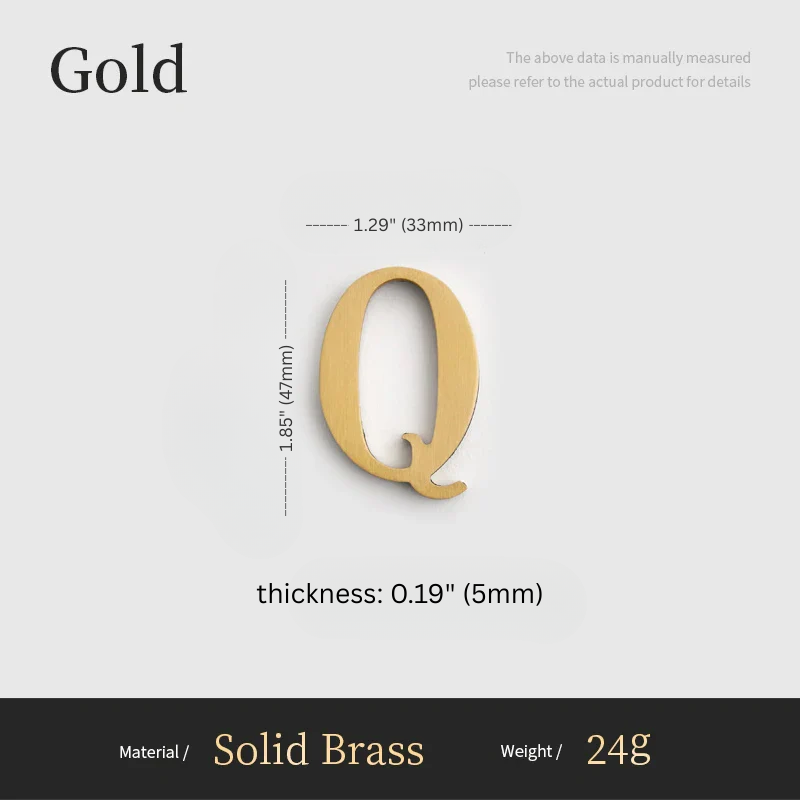 Gold letter 'Q' with measurements on a gray background