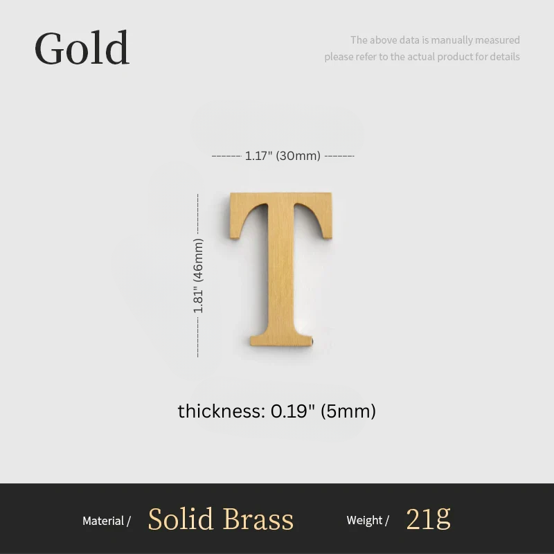 Gold letter 'T' with measurements on a gray background