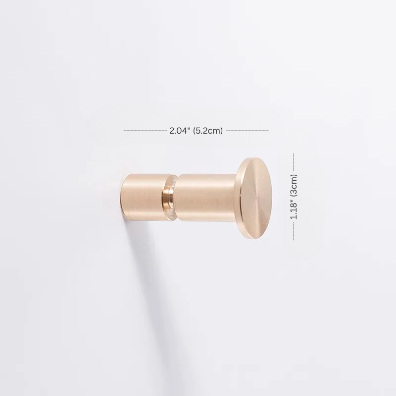 Gold-colored wall hook with dimensions on a white background