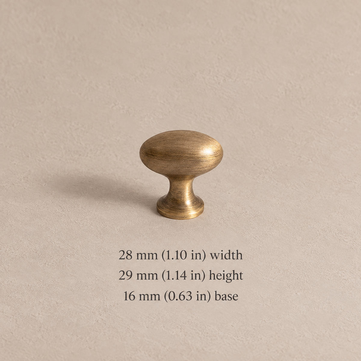 Antique brass small oval knob, 28 mm (1.10 in) wide