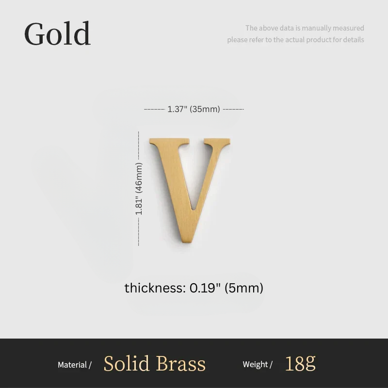 Gold letter 'V' with measurements on a white background