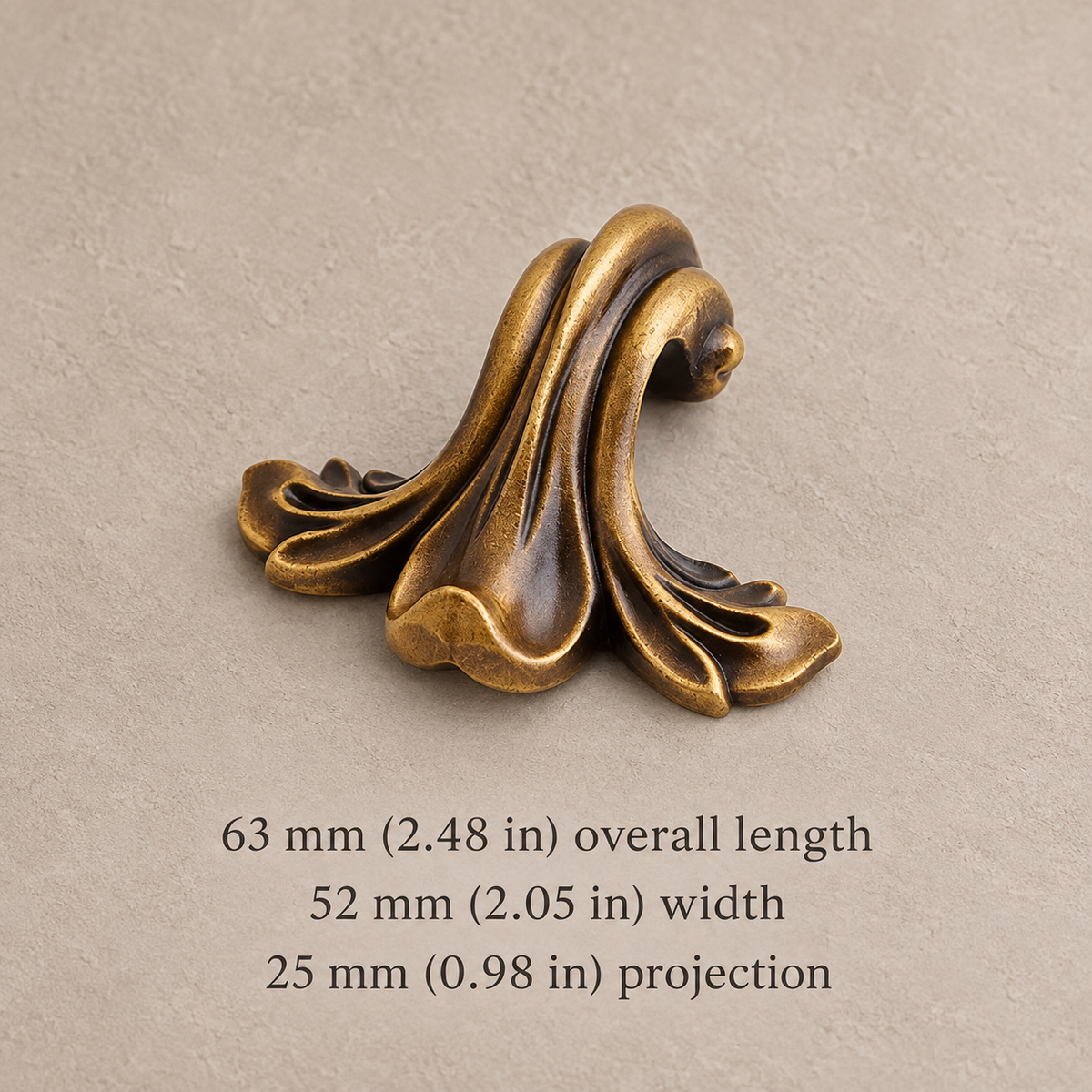 63 mm ornate leaf thumb pull with inch and millimeter dimensions