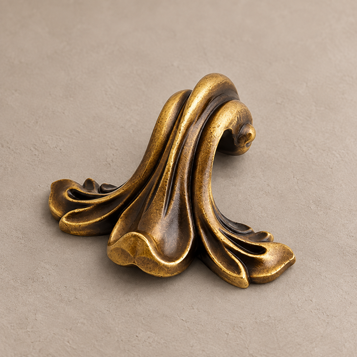 Ornate antique brass finish leaf thumb pull detail